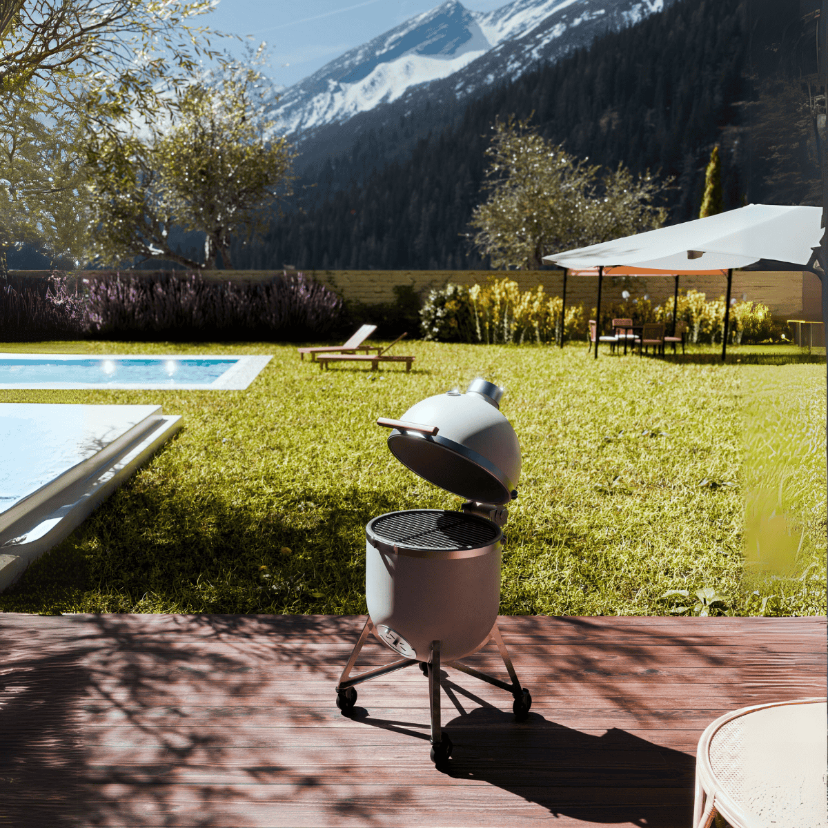 Der Compadre Grillofen auf einer luxuriösen Terrasse vor einer Berglandschaft aus der Nähe