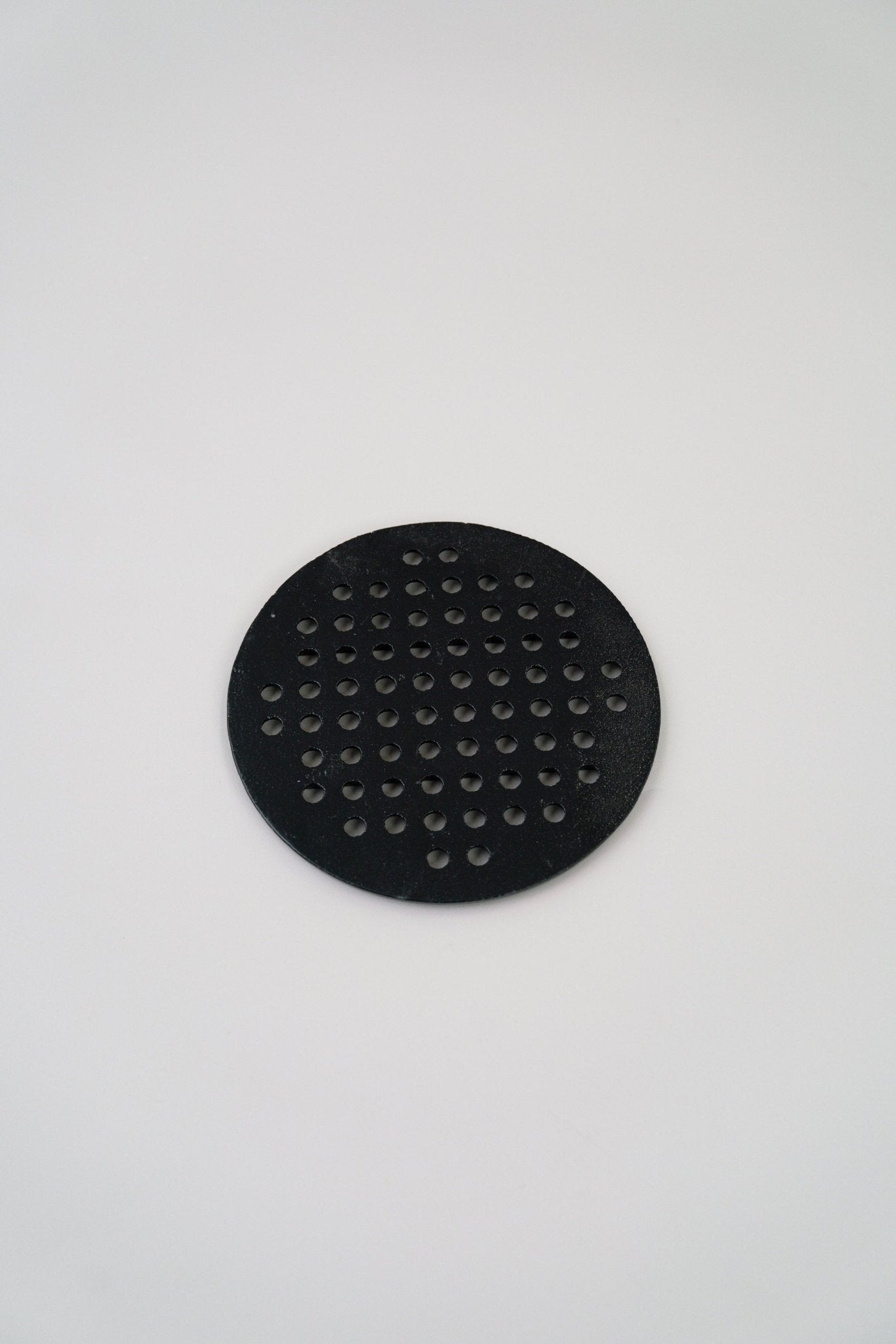 Der Ascherost des Compadre Grill & Ofen aus Gusseisen